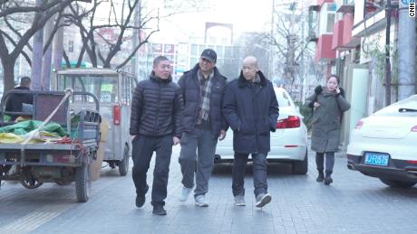 Dong Shengkun (center) and his two fellow former prisoners, Zhang Maosheng and Zhang Yansheng, at their reunion in February.