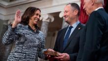 UNITED STATES - JANUARY 03: Vice President Joe Biden administers an oath to Sen. Kamala Harris, D-Calif., during swearing-in ceremony in the Capitol's Old Senate Chamber, January 03, 2016. Her husband Douglas Emhoff holds the bible. (Photo By Tom Williams/CQ Roll Call)