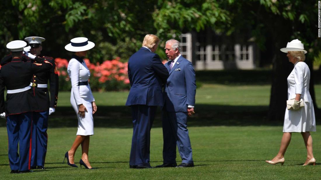Prince Charles greets Trump as he steps off Marine One at Buckingham Palace.