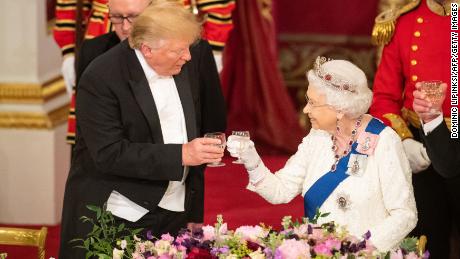 Britain&#39;s Queen Elizabeth II (R) raises a glasses with US President Donald Trump during a State Banquet in the ballroom at Buckingham Palace in central London on June 3, 2019, on the first day of the US president and First Lady&#39;s three-day State Visit to the UK. - Britain rolled out the red carpet for US President Donald Trump on June 3 as he arrived in Britain for a state visit already overshadowed by his outspoken remarks on Brexit. (Photo by Dominic Lipinski / POOL / AFP)        (Photo credit should read DOMINIC LIPINSKI/AFP/Getty Images)