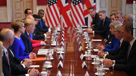 US President Donald Trump (4L) speaks opposite Britain&#39;s Prime Minister Theresa May (3R) at a business roundtable discussion at St. Jamess Palace in London on June 4, 2019, on the second day of the US president and the First Lady&#39;s three-day State Visit to the UK. - US President Donald Trump turns from pomp and ceremony to politics and business on Tuesday as he meets Prime Minister Theresa May on the second day of a state visit expected to be accompanied by mass protests. (Photo by MANDEL NGAN / AFP)        (Photo credit should read MANDEL NGAN/AFP/Getty Images)