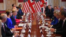 US President Donald Trump (4L) speaks opposite Britain's Prime Minister Theresa May (3R) at a business roundtable discussion at St. Jamess Palace in London on June 4, 2019, on the second day of the US president and the First Lady's three-day State Visit to the UK. - US President Donald Trump turns from pomp and ceremony to politics and business on Tuesday as he meets Prime Minister Theresa May on the second day of a state visit expected to be accompanied by mass protests. (Photo by MANDEL NGAN / AFP)        (Photo credit should read MANDEL NGAN/AFP/Getty Images)