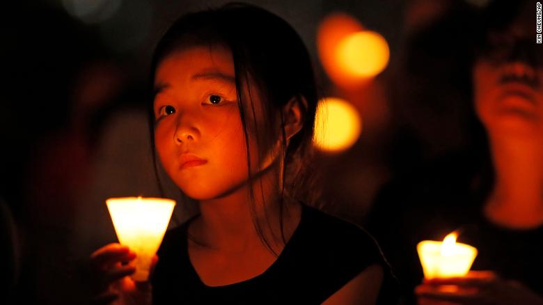 A candlelight vigil, held in Hong Kong&#39;s Victoria Park on Tuesday, remembered the victims of the 1989 massacre in Beijing&#39;s Tiananmen Square.