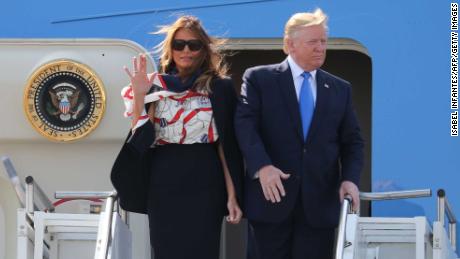 US President Donald Trump (R) and US First Lady Melania Trump (L) disembark Air Force One at Stansted Airport, north of London on June 3, 2019, as they begin a three-day State Visit to the UK. - Britain rolled out the red carpet for US President Donald Trump on June 3 as he arrived in Britain for a state visit already overshadowed by his outspoken remarks on Brexit. (Photo by Isabel Infantes / AFP)        (Photo credit should read ISABEL INFANTES/AFP/Getty Images)