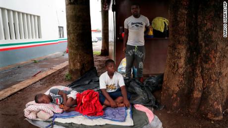 A family of Haitian migrants waits at an immigration center in Tapachula, Mexico, on May 29, 2019. 