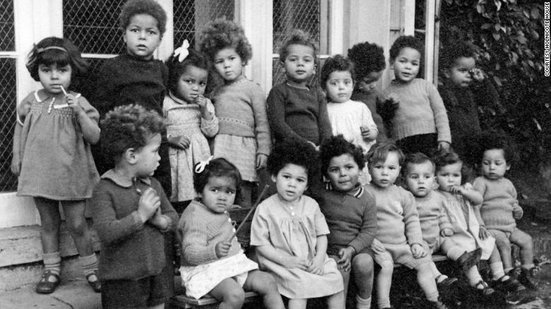 Carol Edwards (back row, fourth from left) and Deborah Prior (front row, third from left) remember their time at Holnicote House in Somerset, southwest England, with great affection.