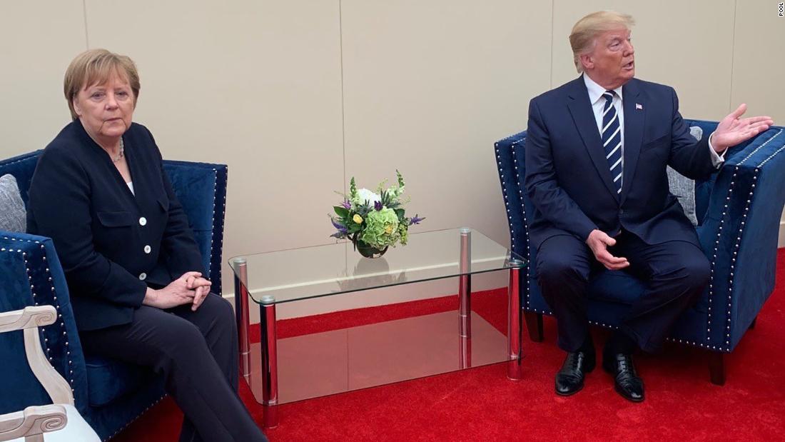 Trump meets with German Chancellor Angela Merkel on the sidelines of the D-Day event in Portsmouth.