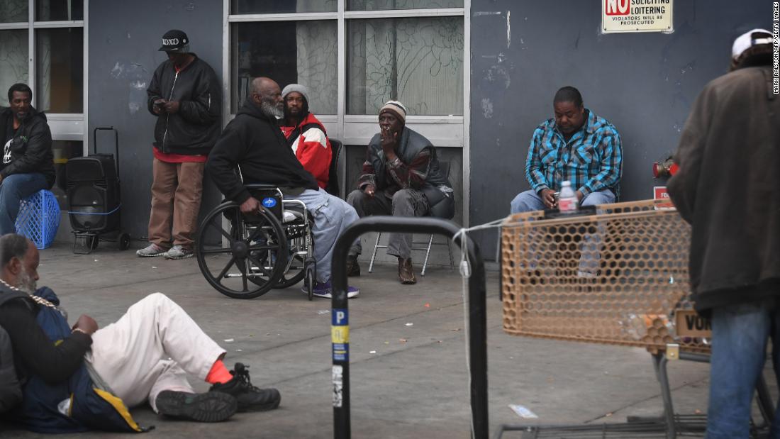 Homeless people gather on the streets of Skid Row near downtown Los Angeles on March 1. A lack of affordable housing in the city is the primary factor driving the spike in homelessness, according to Mayor Eric Garcetti.