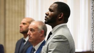 Prosecutors allege R. Kelly's former manager called in gun threats to 'Surviving R. Kelly' screening