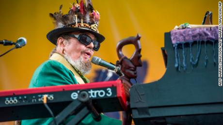 FILE - In this April 30, 2017 file photo, Dr. John performs at the New Orleans Jazz and Heritage Festival in New Orleans. The New Orleans-born musician celebrated his 77th birthday last Nov. 21 in the French Quarter. But he was apparently a year early. Publicist Karen Beninato said she looked into it after talking to friends and relatives of the Rock &amp; Roll Hall of Famer. (Photo by Amy Harris/Invision/AP, File)