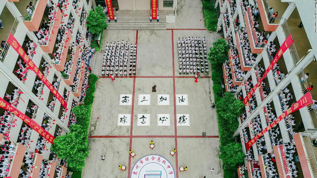 High school students in Huizhou shout words of encouragement on June 5, 2019, ahead of the college entrance exam.