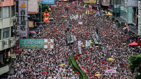 HONG KONG, HONG KONG - JUNE 09:  Protesters march on a street during a rally against the extradition law proposal on June 9, 2019 in Hong Kong China. Hundreds of thousands of protesters marched in Hong Kong in Sunday against a controversial extradition bill that would allow suspected criminals to be sent to mainland China for trial.(Photo by Anthony Kwan/Getty Images)