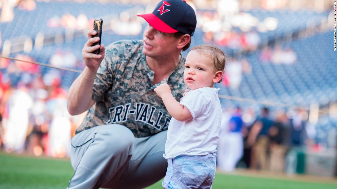 Swallwell and his son, Nelson, attend the Congressional Baseball Game in June 2018. Swalwell has two children with his wife, Brittany.