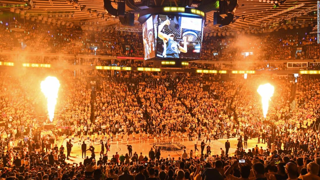 Warriors fans get ready for Game 3 at Oracle Arena. Next season, the team moves into a new arena in San Francisco.