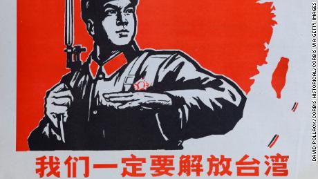 An historic Chinese Cultural Revolution poster, showing a Chinese soldier and the island of Taiwan. &quot;We must liberate Taiwan,&quot; the caption says.