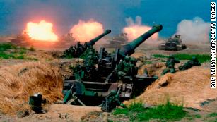 US-made CM-11 tanks are fired in front of two 8-inch self-propelled artillery guns during military drills in southern Taiwan on May 30.