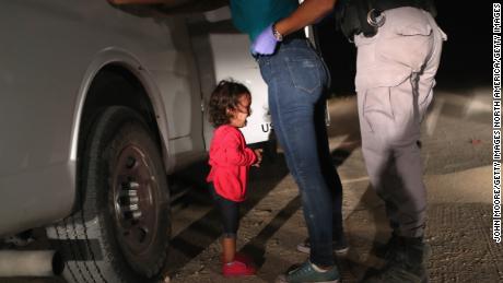 MCALLEN, TX - JUNE 12: A two-year-old Honduran asylum seeker cries as her mother is searched and detained near the U.S.-Mexico border on June 12, 2018 in McAllen, Texas. The asylum seekers had rafted across the Rio Grande from Mexico and were detained by U.S. Border Patrol agents before being sent to a processing center for possible separation. Customs and Border Protection (CBP) is executing the Trump administration&#39;s &quot;zero tolerance&quot; policy towards undocumented immigrants. U.S. Attorney General Jeff Sessions also said that domestic and gang violence in immigrants&#39; country of origin would no longer qualify them for political asylum status.  (Photo by John Moore/Getty Images)