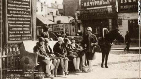 Russian schoolgirls chatting on the street in Harbin in around 1929.  