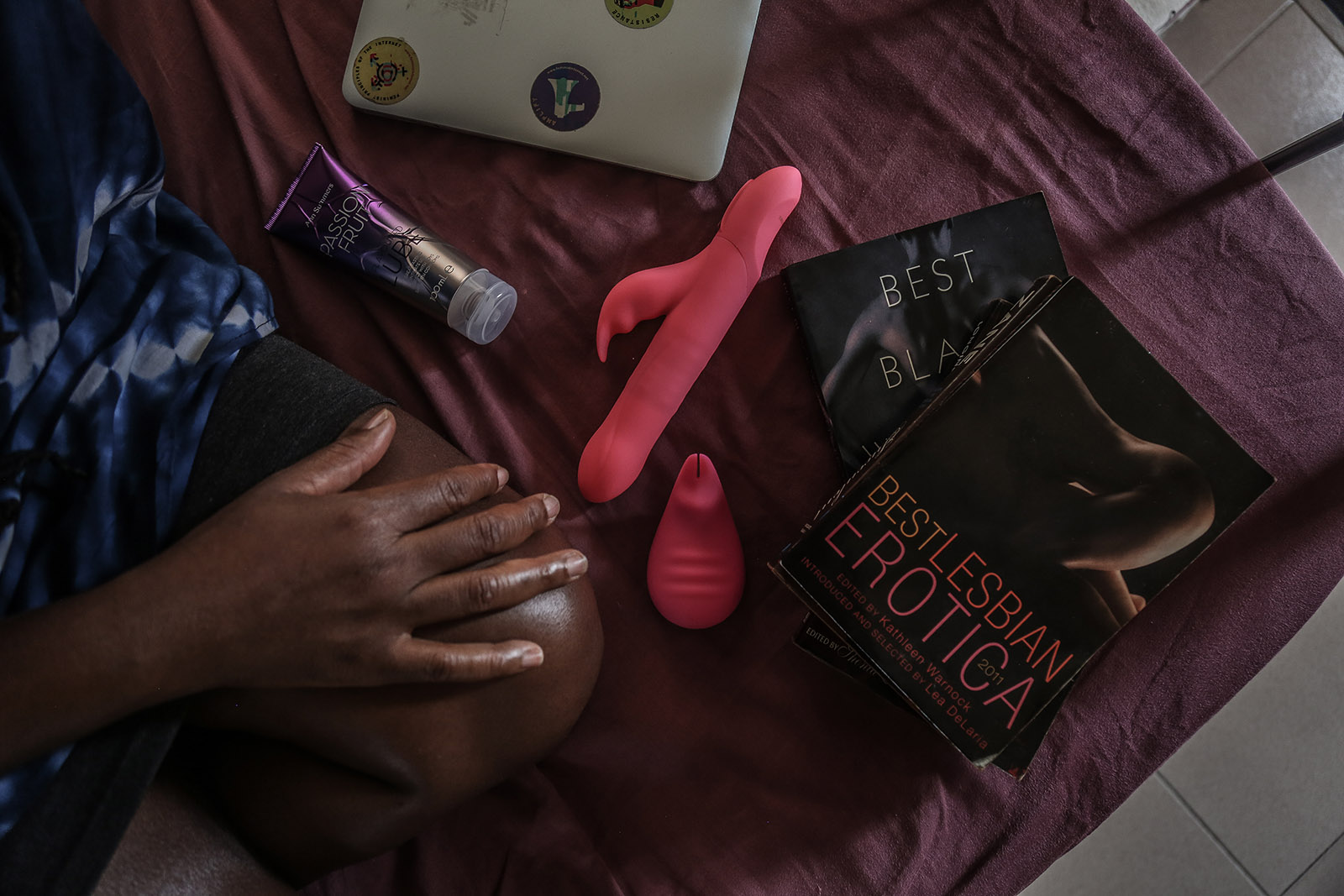 Sekyiamah displays some of her toys and erotic novels.