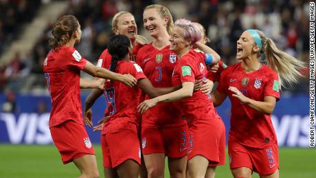 Samantha Mewis of the USA celebrates with teammates after scoring her team&#39;s fourth goal during the match against Thailand on Tuesday in France.