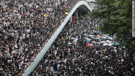 Protesters march along a road demonstrating against a proposed extradition bill in Hong Kong, China June 12, 2019. 