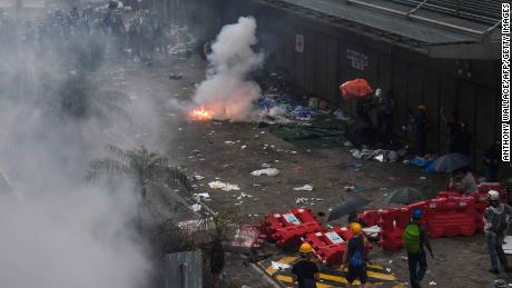 Police clash with protesters during a demonstration outside the government headquarters in Hong Kong on June 12.