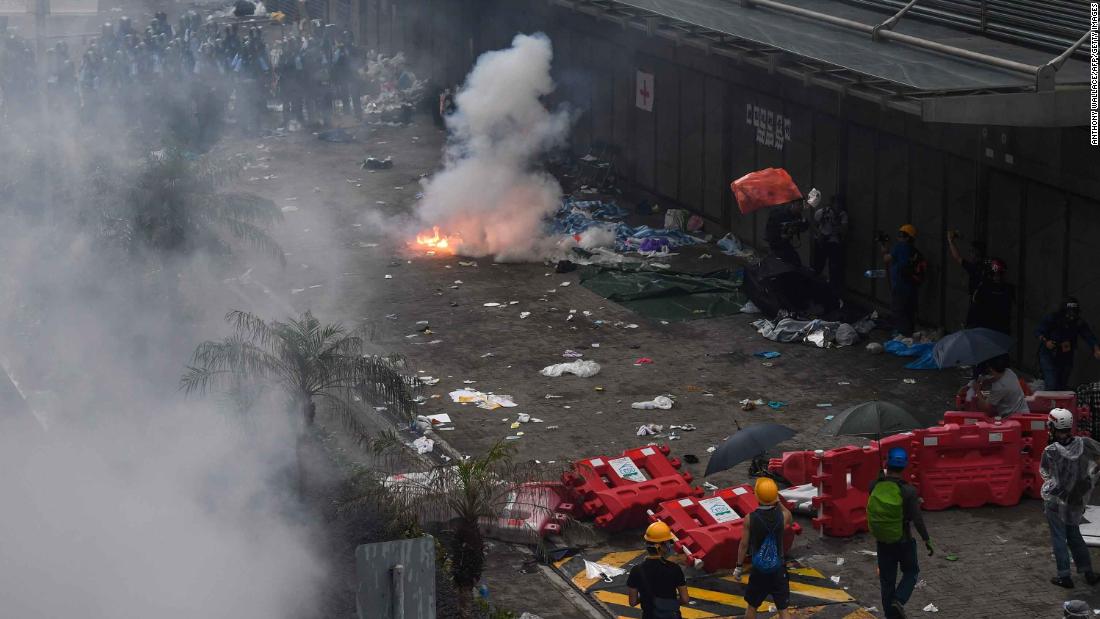 Police clash with protesters during a demonstration outside the government headquarters in Hong Kong on June 12.