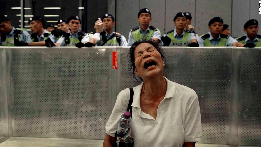 A protester reacts as police and demonstrators clash on June 10.