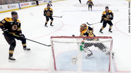 Boston Bruins goalie Tuukka Rask stops a shot in the NHL Stanley Cup final in 2019.