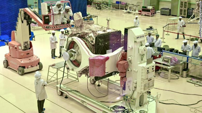 Indian Space Research Organisation (ISRO) scientists work on the orbiter vehicle of 'Chandrayaan-2' in Bangalore.
