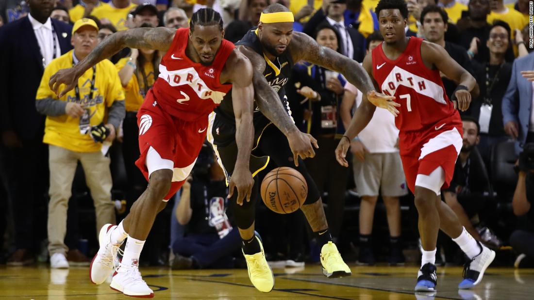 Leonard and DeMarcus Cousins battle for a loose ball late in Game 6 as the Raptors led by one and the last few seconds ticked away.
