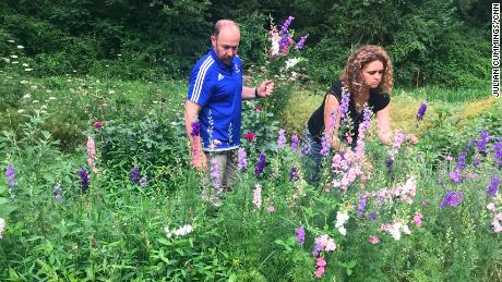 Amanda Pritchard picks flowers with her husband Bob on their farm in Tennessee.