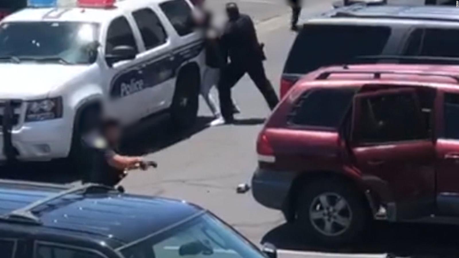 Video Shows Police Drawing Gun On Parents
