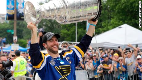 St. Louis Blues defenseman and captain Alex Pietrangelo carries the Stanley Cup during the Blues&#39; NHL hockey Stanley Cup victory celebration in St. Louis on Saturday, June 15, 2019. (AP Photo/Darron Cummings)