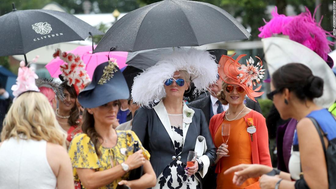 Light rain Tuesday couldn&#39;t dampen spirits at Royal Ascot in Berkshire, west of London.   