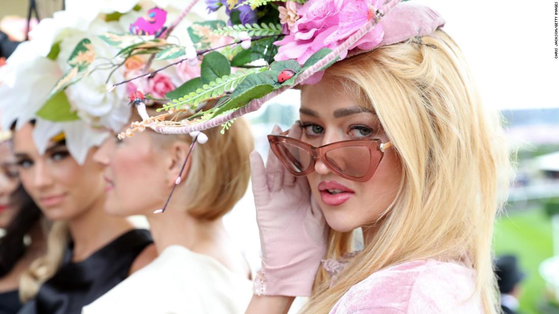 Racegoers are encouraged to express themselves within the confines of a strict dress code. 
