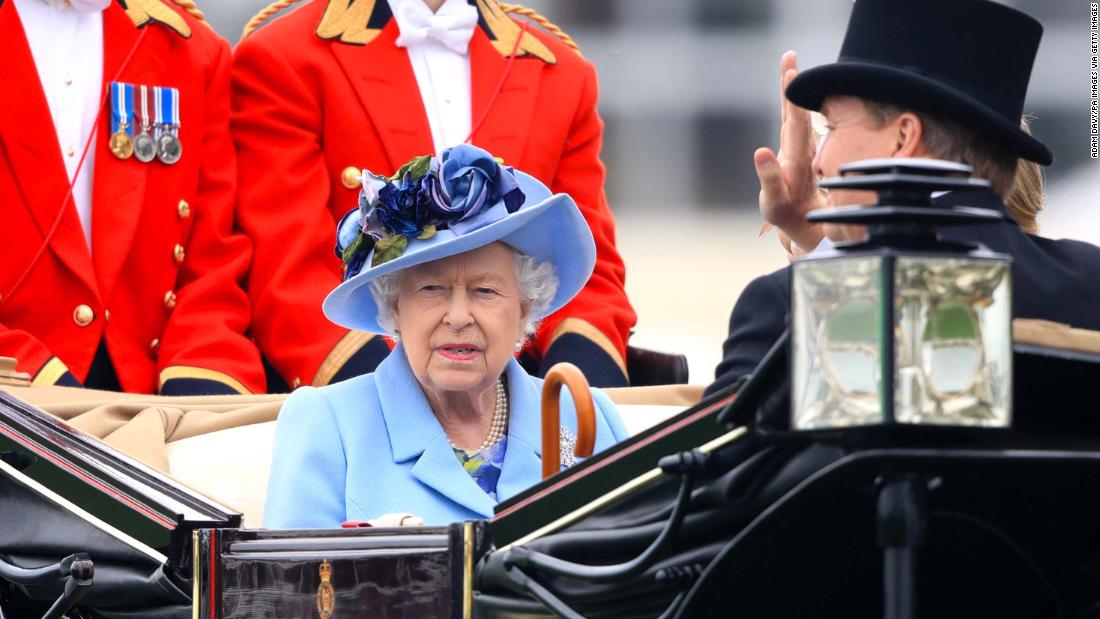 Britain&#39;s Queen Elizabeth II riding in the leading carriage during the Royal Procession to open Royal Ascot 2019. 