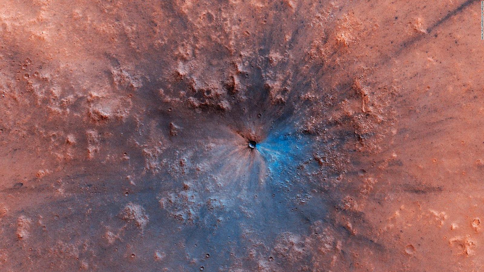 NASA releases new image of an impact crater on the surface of Mars. It