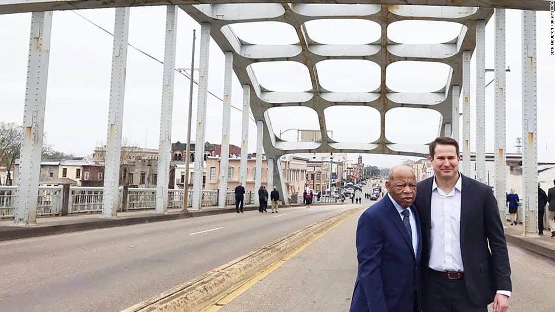 Moulton poses with US Rep. John Lewis, a civil rights icon, in Selma, Alabama, in March 2019. &quot;After 54 years, John Lewis is still walking across Edmund Pettus Bridge in the name of freedom and equality,&quot; &lt;a href=&quot;https://www.facebook.com/SethMoulton/photos/a.367186863420256/1320631628075770/?type=3&amp;theater&quot; target=&quot;_blank&quot;&gt;Moulton said on Facebook.&lt;/a&gt; &quot;Today I was proud to walk with him.&quot;