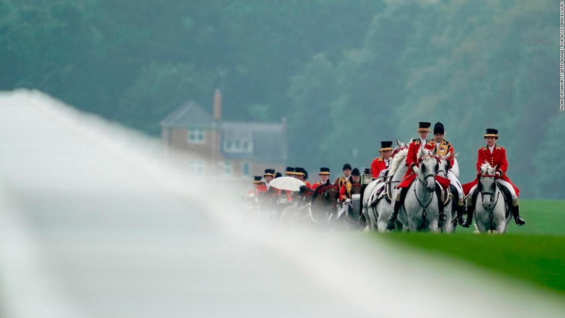 The Royal Procession makes its way down the Straight Mile at Royal Ascot ahead of racing.