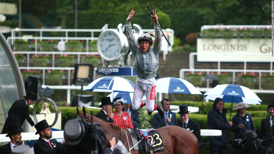 Veteran Italian jockey Frankie Dettori treats the crowd to his trademark flying dismount after clinching his 61st winner at Royal Ascot in the opener.