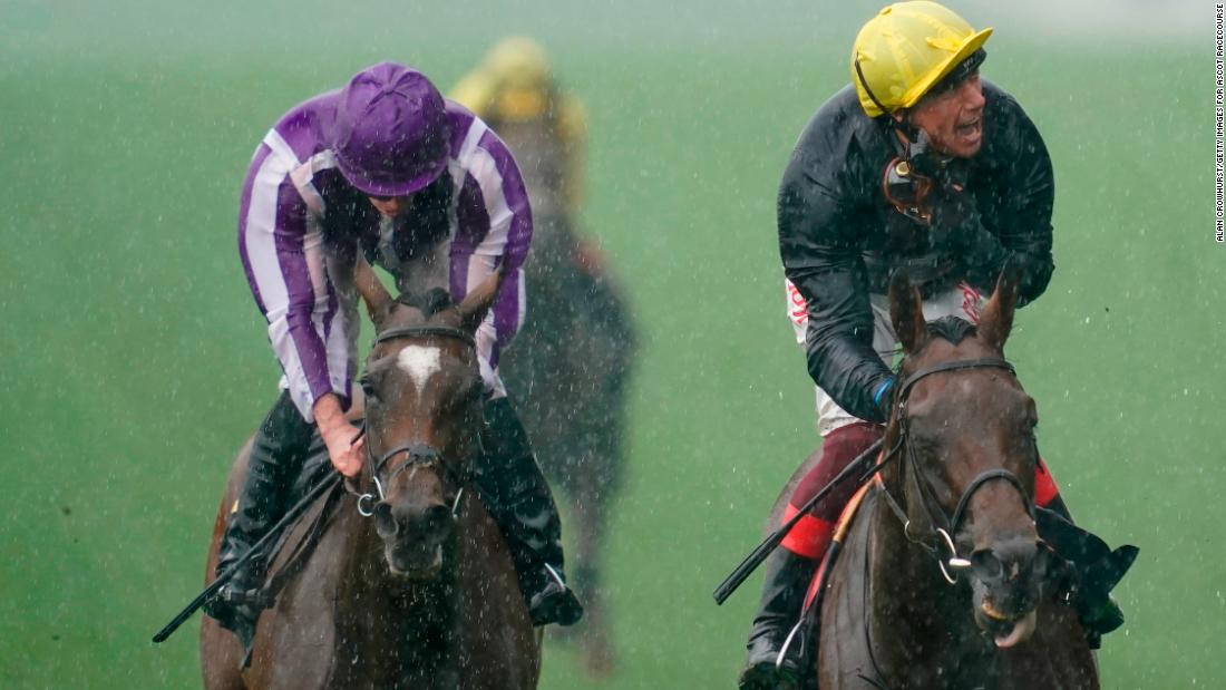 The heavens opened later Wednesday as Frankie Dettori rode Crystal Ocean (right) to victory in the showpiece Prince Of Wales&#39;s Stakes.