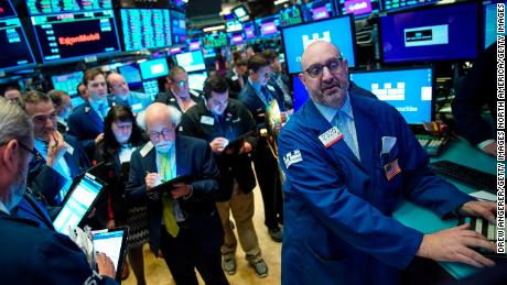 NEW YORK, NY - JUNE 20: Traders and financial professionals work after representatives from Slack rang the opening bell the New York Stock Exchange (NYSE), June 20, 2019 in New York City. The workplace messaging app Slack will list on the New York Stock Exchange this morning. NYSE set the reference price for the direct listing at $26 per share late on Wednesday. (Photo by Drew Angerer/Getty Images)