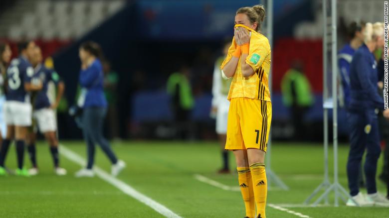 Scotland&#39;s Lee Alexander wipes away the tears after the 3-3 draw with Argentina.