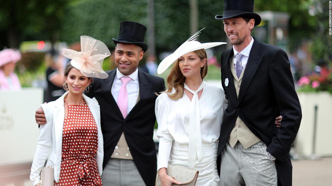 Premier League footballers Peter Crouch (right) and Glen Johnson with their wives on Ladies&#39; Day.