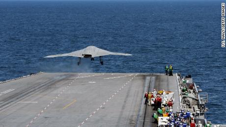 ATLANTIC OCEAN - MAY 14:  In this handout released by the U.S. Navy, An X-47B Unmanned Combat Air System (UCAS) demonstrator launches from the flight deck of the aircraft carrier USS George H.W. Bush (CVN 77) May 14, 2013 in the Atlantic Ocean. George H.W. Bush is the first aircraft carrier to sucessfully catapult-launch an unmanned aircraft from its flight deck. The Navy plans to have unmanned aircraft on each of its carriers to be used for surveillance and be armed and used in combat roles.  (Photo by U.S. Navy via Getty Images)