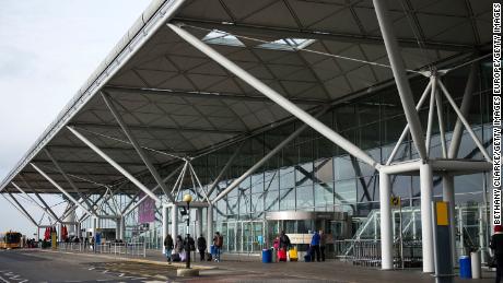 A 25-year-old woman was arrested by Essex Police after the aircraft returned to Stansted.