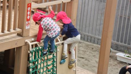Children play on the playground at a public day care in Minato ward in Tokyo.