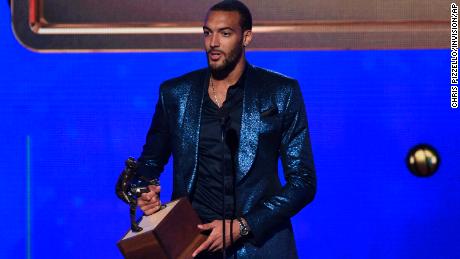 Rudy Gobert, of the Utah Jazz, accepts the NBA defensive player of the year award at the NBA Awards.