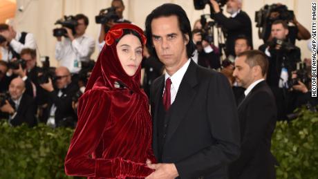 Susie Cave and Nick Cave arrive for the 2018 Met Gala on May 7, 2018, at the Metropolitan Museum of Art in New York. - The Gala raises money for the Metropolitan Museum of Arts Costume Institute. The Gala&#39;s 2018 theme is Heavenly Bodies: Fashion and the Catholic Imagination. (Photo by Hector RETAMAL / AFP) (Photo credit should read HECTOR RETAMAL/AFP/Getty Images)